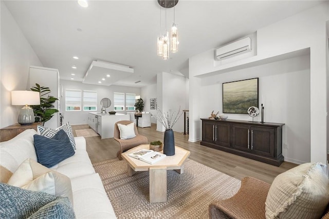426 W Central Ave, Brea, CA 92821 - living area featuring a wall mounted AC and light wood-type flooring