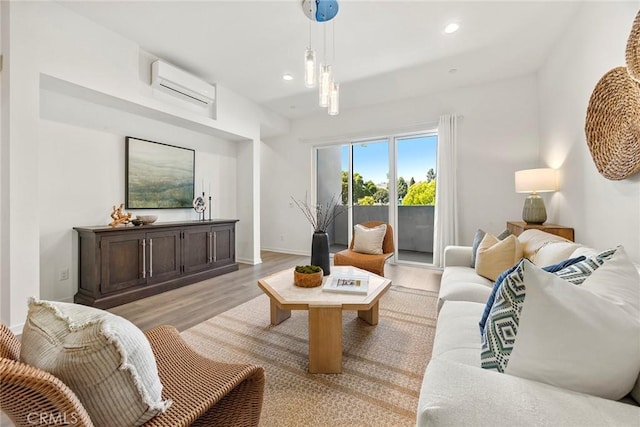 426 W Central Ave, Brea, CA 92821 - living area with a wall mounted air conditioner, light wood-style flooring, and recessed lighting