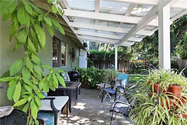 2997 June Ct, Merced, CA 95348 - fenced backyard featuring a pergola and a patio area