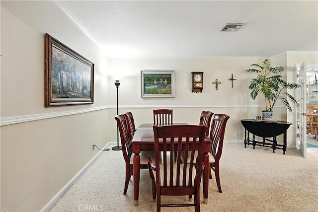 2997 June Ct, Merced, CA 95348 - dining space featuring carpet floors and ornamental molding