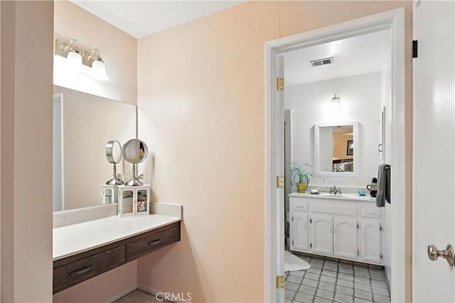 2997 June Ct, Merced, CA 95348 - bathroom with vanity and tile patterned floors