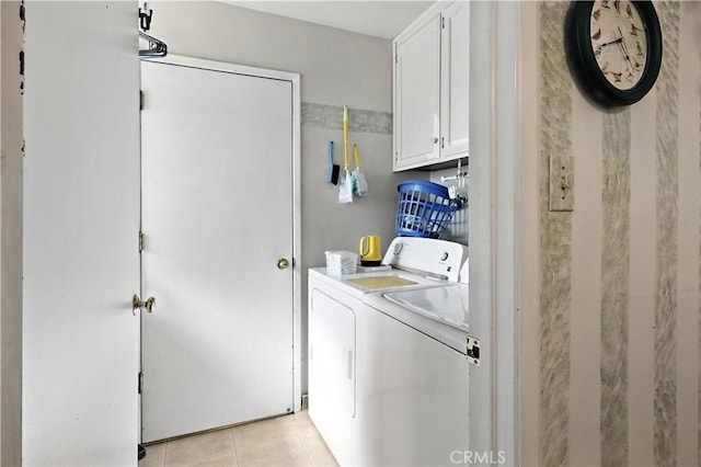 2997 June Ct, Merced, CA 95348 - laundry area featuring cabinet space, separate washer and dryer, and light tile patterned floors