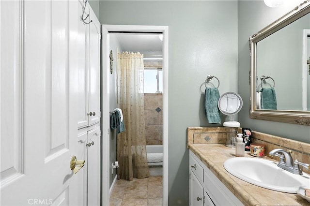 2997 June Ct, Merced, CA 95348 - bathroom featuring vanity, shower / tub combo, and tile patterned floors