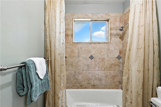 2997 June Ct, Merced, CA 95348 - full bathroom with shower / tub combo with curtain and toilet