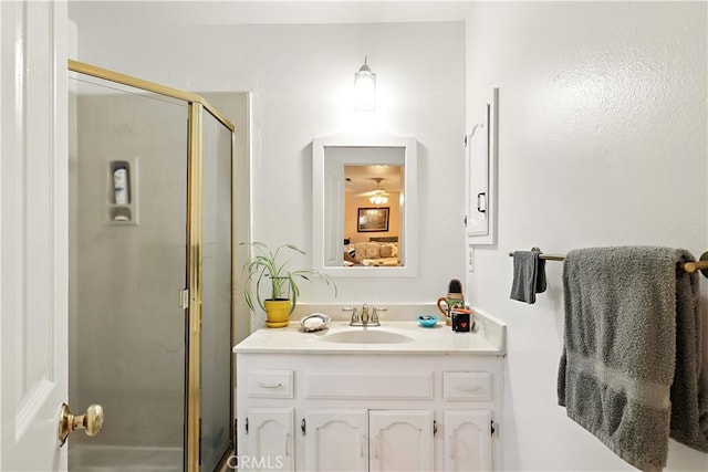 2997 June Ct, Merced, CA 95348 - bathroom featuring a stall shower, vanity, and ceiling fan