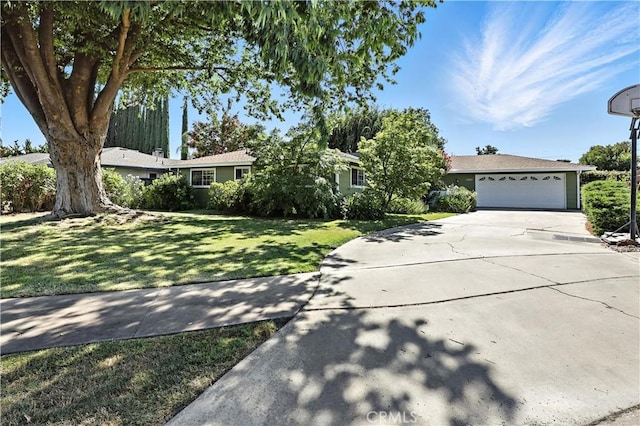 2997 June Ct, Merced, CA 95348 - single story home with a garage, driveway, and a front lawn