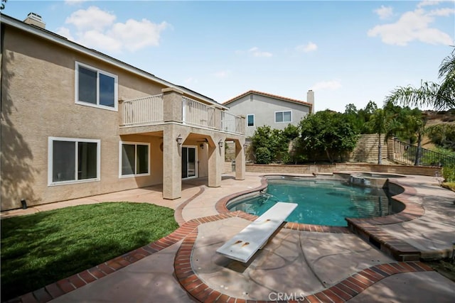 30526 Beryl Pl, Castaic, CA 91384 - view of swimming pool with stairway, a diving board, a patio area, and a pool with connected hot tub
