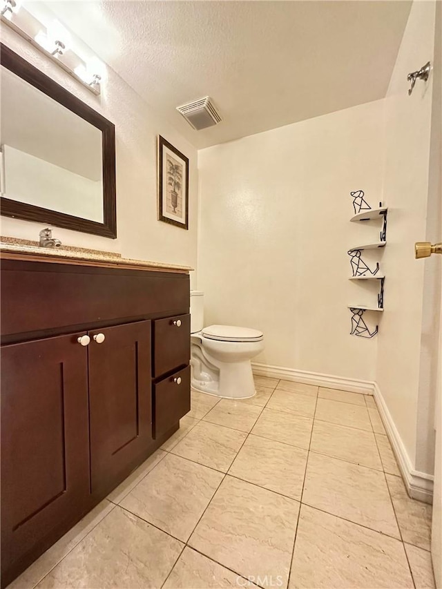 1602 Via Palermo, Montebello, CA 90640 - bathroom with vanity, tile patterned flooring, and a textured ceiling