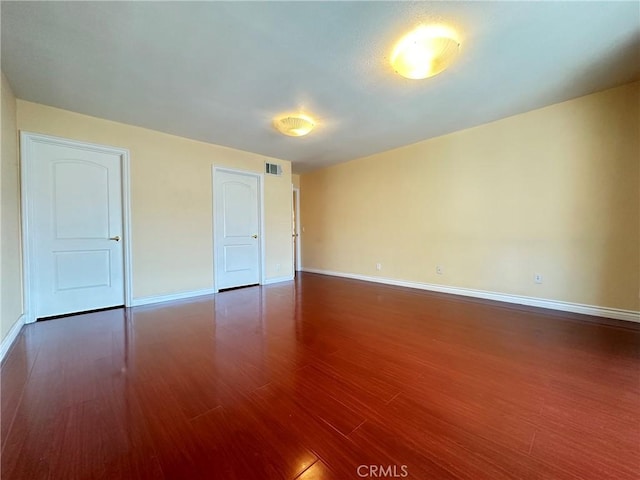 1602 Via Palermo, Montebello, CA 90640 - empty room featuring dark wood-type flooring and baseboards