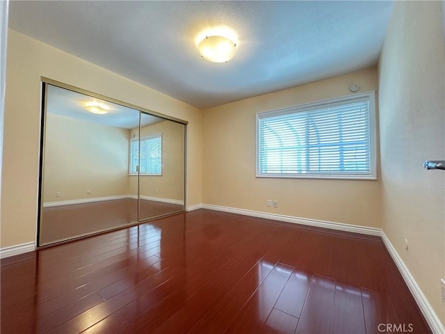 1602 Via Palermo, Montebello, CA 90640 - unfurnished bedroom featuring a closet and wood finished floors