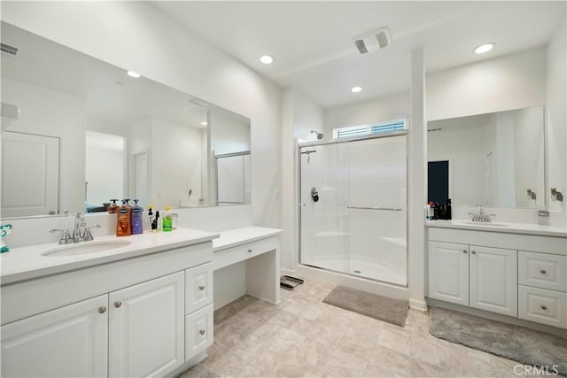 36300 Firelight Cir, Wildomar, CA 92595 - bathroom featuring a stall shower, two vanities, and recessed lighting