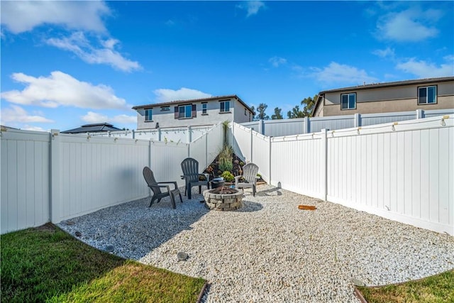 36300 Firelight Cir, Wildomar, CA 92595 - fenced backyard featuring a fire pit and a patio