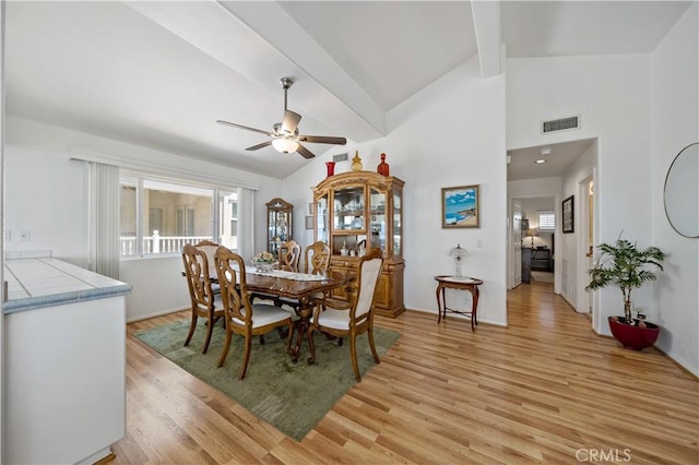 6536 Oceanview Dr Unit T, Carlsbad, CA 92011 - dining area featuring a ceiling fan and light wood-style flooring