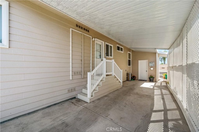 6536 Oceanview Dr Unit T, Carlsbad, CA 92011 - view of patio / terrace with an attached carport