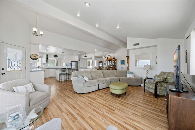 6536 Oceanview Dr Unit T, Carlsbad, CA 92011 - living room featuring a chandelier, light wood-style flooring, healthy amount of natural light, and recessed lighting