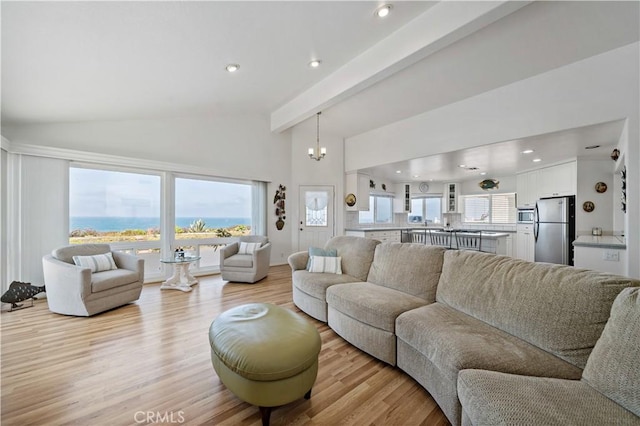 6536 Oceanview Dr Unit T, Carlsbad, CA 92011 - living area with light wood-type flooring, a chandelier, and recessed lighting
