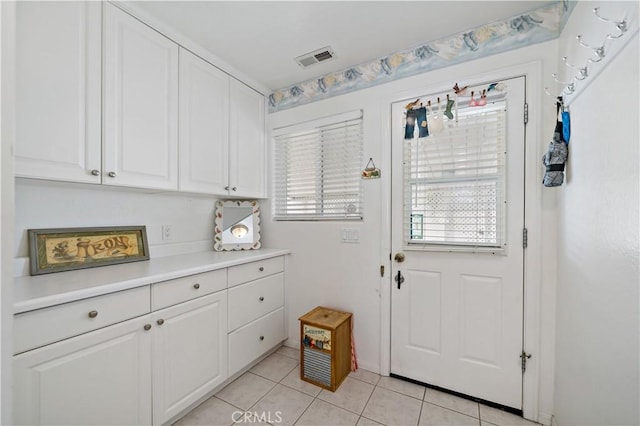 6536 Oceanview Dr Unit T, Carlsbad, CA 92011 - entryway with light tile patterned floors