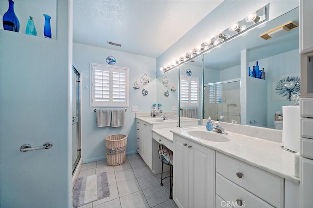 6536 Oceanview Dr Unit T, Carlsbad, CA 92011 - bathroom with vanity, a shower stall, and tile patterned floors