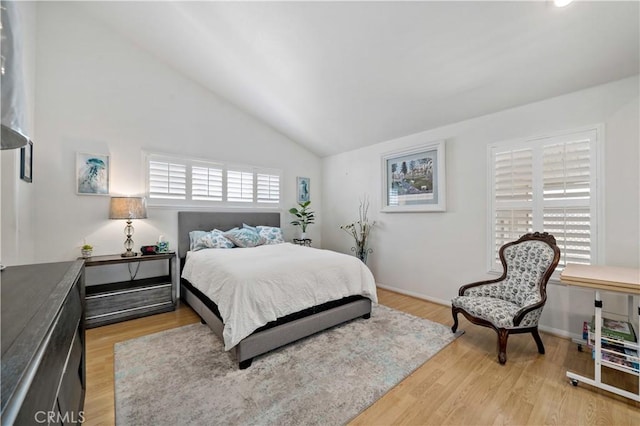 6536 Oceanview Dr Unit T, Carlsbad, CA 92011 - bedroom featuring lofted ceiling and light wood-style flooring