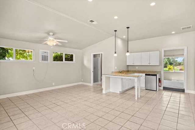 2915 Kennedy Ave Unit A & B, Chico, CA 95973 - kitchen featuring dishwasher, a kitchen bar, vaulted ceiling, a ceiling fan, and white cabinetry