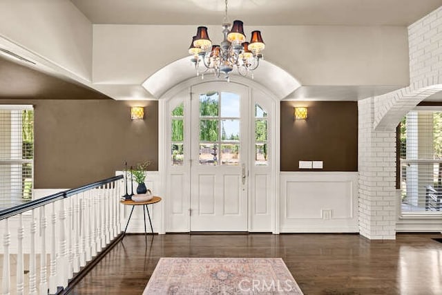 2915 Kennedy Ave Unit A & B, Chico, CA 95973 - entrance foyer with wood finished floors, a chandelier, a wainscoted wall, and a decorative wall