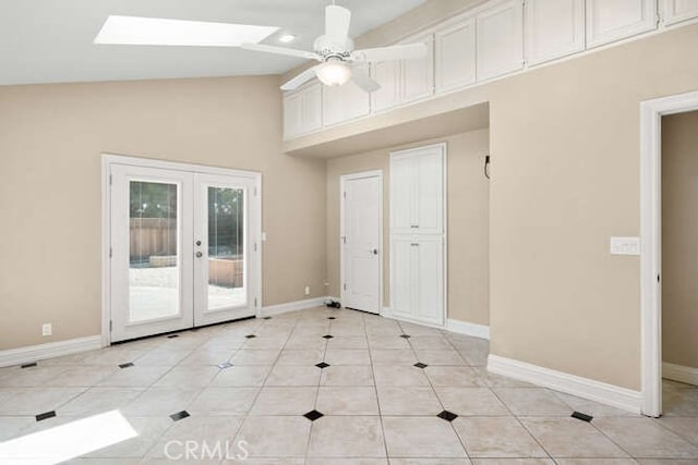 2915 Kennedy Ave Unit A & B, Chico, CA 95973 - unfurnished room with french doors, ceiling fan, light tile patterned flooring, a skylight, and high vaulted ceiling