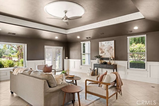 2915 Kennedy Ave Unit A & B, Chico, CA 95973 - living room with a raised ceiling, a decorative wall, light tile patterned floors, a wainscoted wall, and recessed lighting