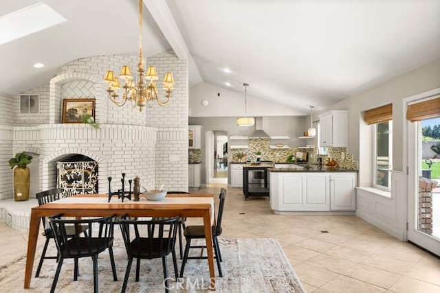 2915 Kennedy Ave Unit A & B, Chico, CA 95973 - dining area with a chandelier, light tile patterned floors, beamed ceiling, and high vaulted ceiling