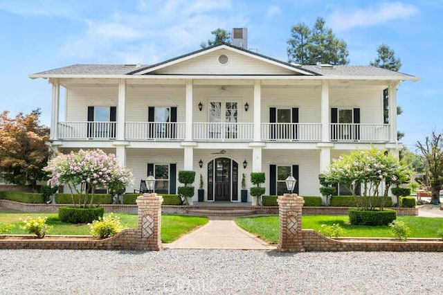 2915 Kennedy Ave Unit A & B, Chico, CA 95973 - neoclassical / greek revival house featuring a balcony, a porch, a chimney, and a front yard