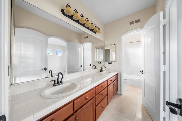 1033 Goldeneye, Carlsbad, CA 92011 - full bathroom with double vanity and tile patterned floors