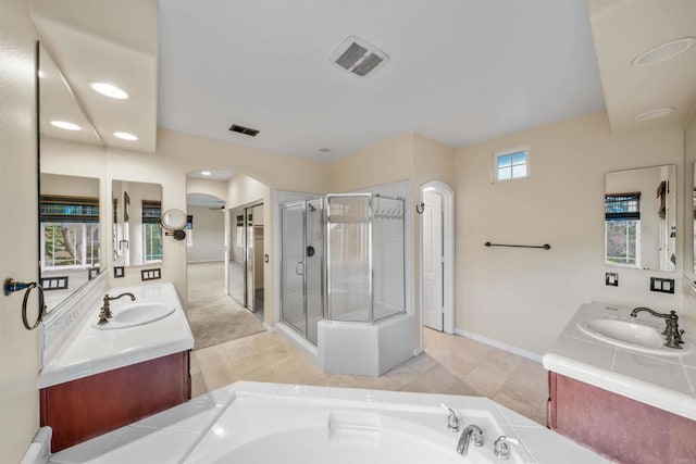 1033 Goldeneye, Carlsbad, CA 92011 - bathroom featuring a stall shower, vanity, a bath, recessed lighting, and tile patterned floors