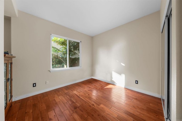 1033 Goldeneye, Carlsbad, CA 92011 - unfurnished living room with wood finished floors and baseboards