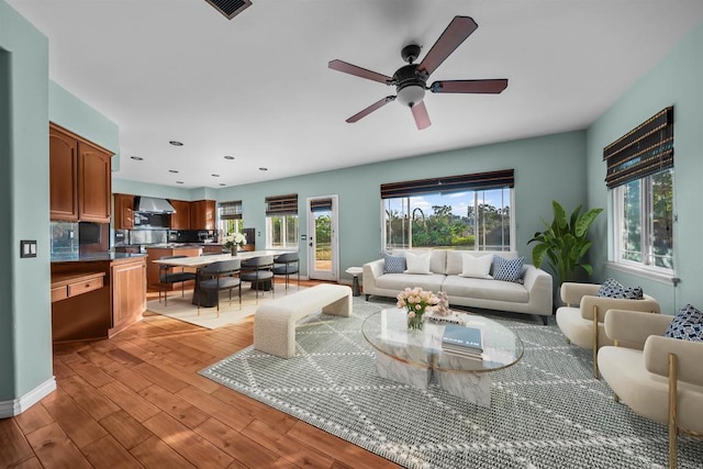1033 Goldeneye, Carlsbad, CA 92011 - living room with plenty of natural light, light wood-type flooring, ceiling fan, and recessed lighting