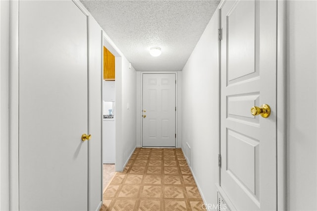 16257 Avalon Ave, Victorville, CA 92395 - corridor featuring a textured ceiling and baseboards