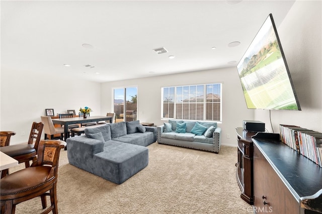 27108 Oncore Dr, Menifee, CA 92585 - living room with light colored carpet and recessed lighting
