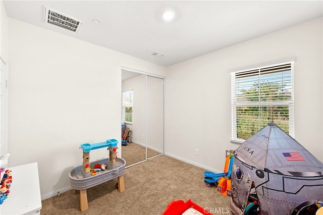 27108 Oncore Dr, Menifee, CA 92585 - game room with plenty of natural light and carpet floors