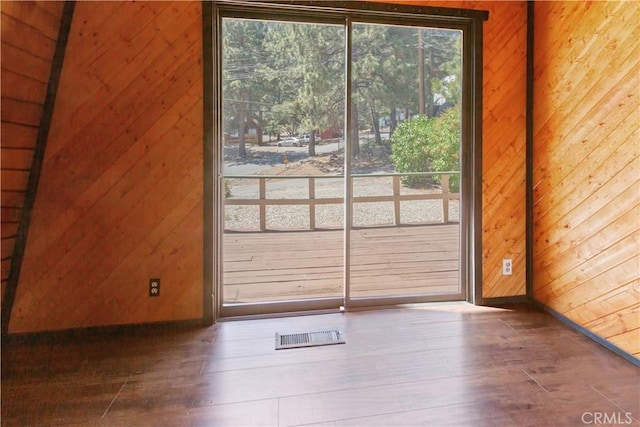 2068 Slippery Elm Rd, Wrightwood, CA 92397 - unfurnished room with hardwood / wood-style floors and wooden walls