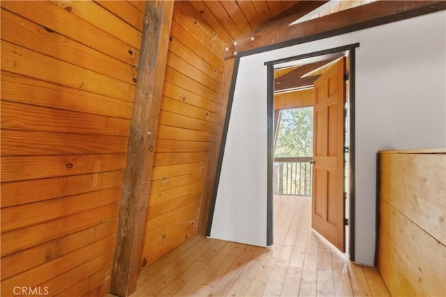 2068 Slippery Elm Rd, Wrightwood, CA 92397 - hall with light wood-type flooring, vaulted ceiling, wooden walls, and wooden ceiling