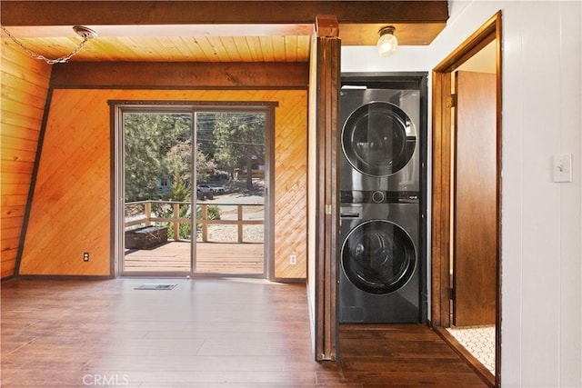2068 Slippery Elm Rd, Wrightwood, CA 92397 - laundry room with stacked washer and clothes dryer, wood walls, hardwood / wood-style flooring, and wood ceiling