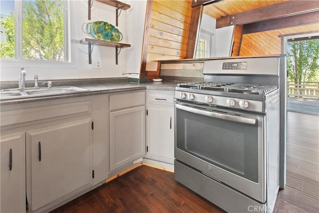 2068 Slippery Elm Rd, Wrightwood, CA 92397 - kitchen featuring gas range, open shelves, dark wood finished floors, white cabinets, and dark countertops