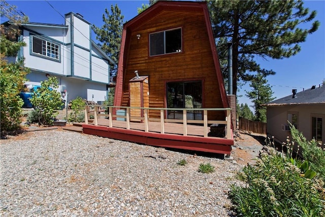 2068 Slippery Elm Rd, Wrightwood, CA 92397 - rear view of house featuring a wooden deck and a gambrel roof