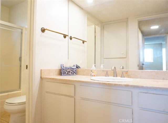 570 W Stocker St Unit 202, Glendale, CA 91202 - full bathroom featuring vanity, tile patterned floors, and bath / shower combo with glass door