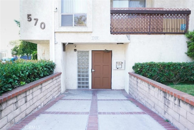 570 W Stocker St Unit 202, Glendale, CA 91202 - doorway to property featuring stucco siding