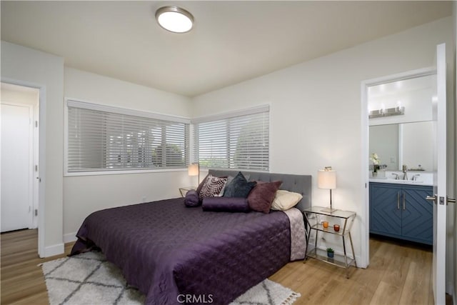 1610 Wandering Dr, Monterey Park, CA 91754 - bedroom featuring light wood finished floors and ensuite bath