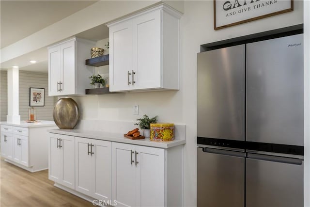 1610 Wandering Dr, Monterey Park, CA 91754 - kitchen featuring freestanding refrigerator, open shelves, white cabinetry, and light countertops