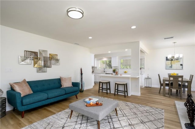 1610 Wandering Dr, Monterey Park, CA 91754 - living area featuring a chandelier, light wood-style flooring, and recessed lighting