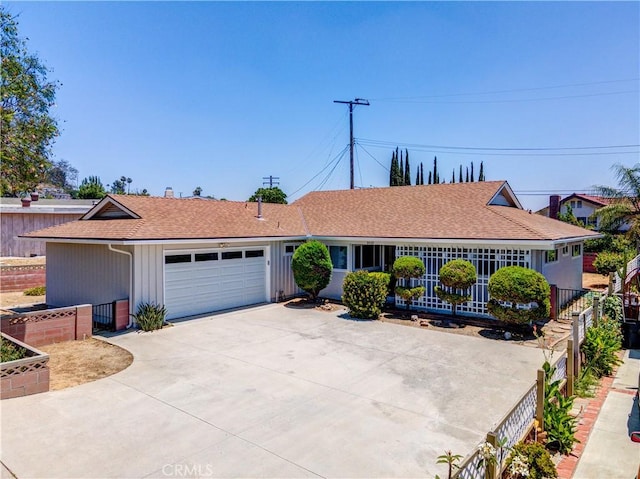 1610 Wandering Dr, Monterey Park, CA 91754 - single story home featuring a garage, driveway, and a shingled roof