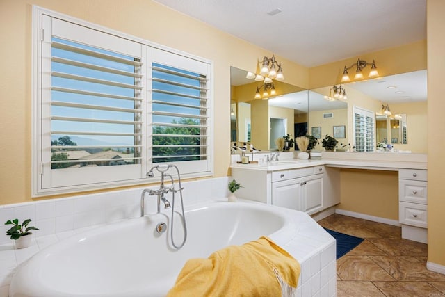 27002 Red Maple St, Murrieta, CA 92562 - full bath featuring vanity, a bath, a chandelier, and tile patterned flooring