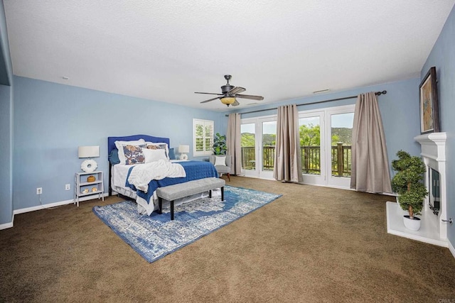 27002 Red Maple St, Murrieta, CA 92562 - bedroom featuring multiple windows, carpet floors, access to outside, and a textured ceiling