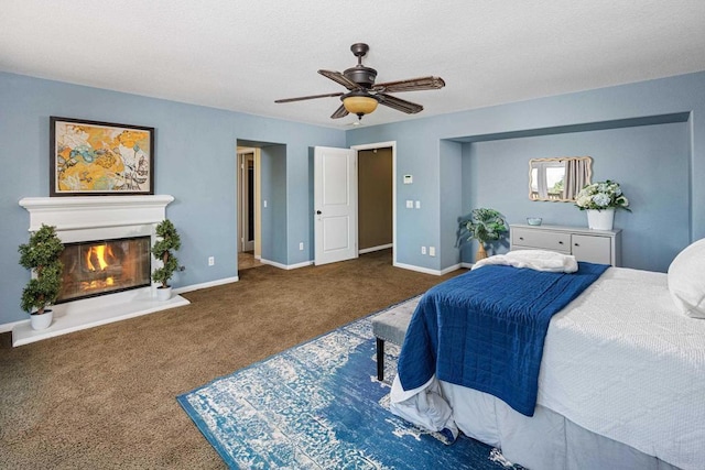 27002 Red Maple St, Murrieta, CA 92562 - carpeted bedroom with a glass covered fireplace and a ceiling fan